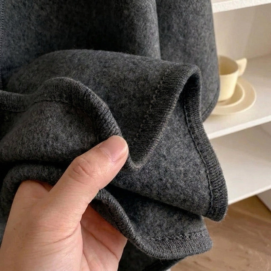 VALERIA | CAPA TIPO PONCHO DE PUNTO CON CINTURÓN